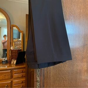 Women’s black slacks polyester 6% spandex
Curvy fit